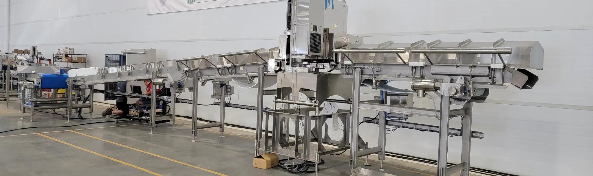 Integrated stainless steel washdown conveyor system